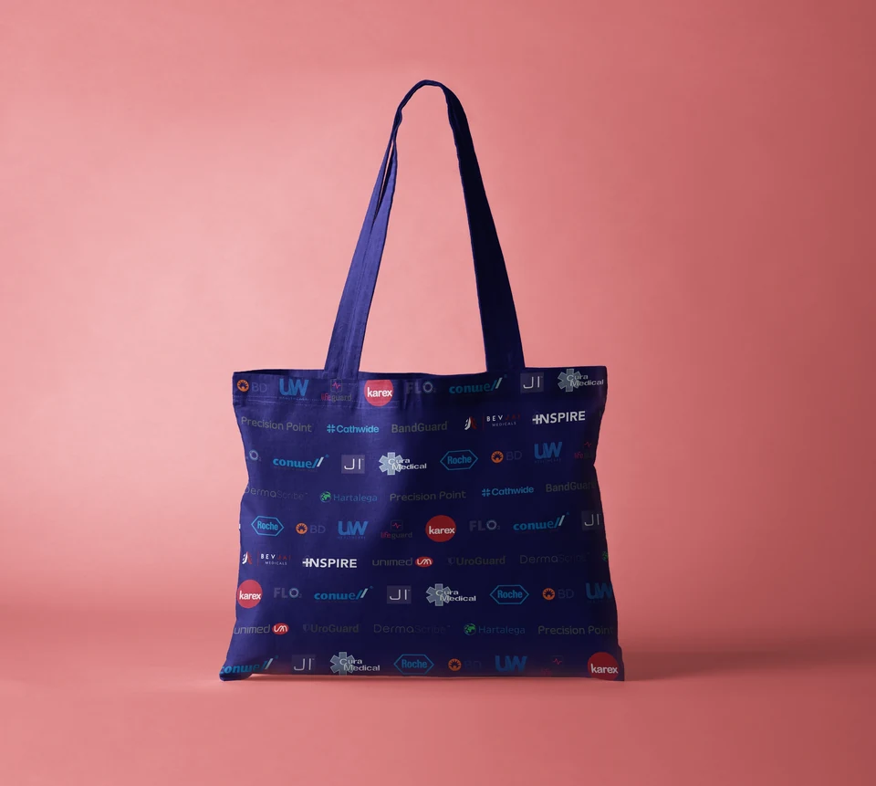 Existing design mockup of a navy Jehu delegate tote with product brand pattern.