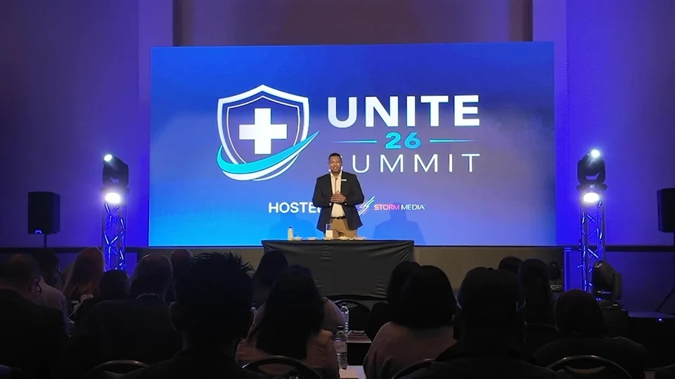 Stage and audience at the UNITE summit